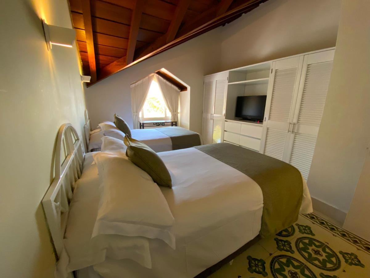 Hotel Las Americas Casa De Playa Cartagena Luaran gambar A room at the hotel