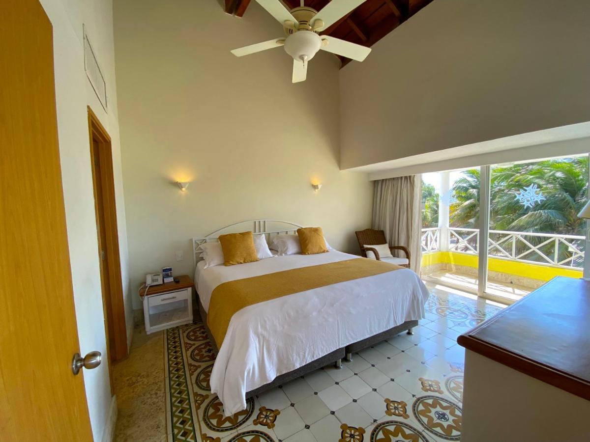 Hotel Las Americas Casa De Playa Cartagena Luaran gambar A bedroom at the hotel